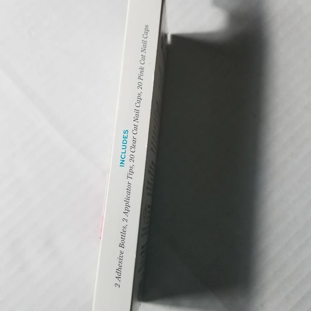 NEW IN BOX WELL AND GOOD CAT NAIL CAPS